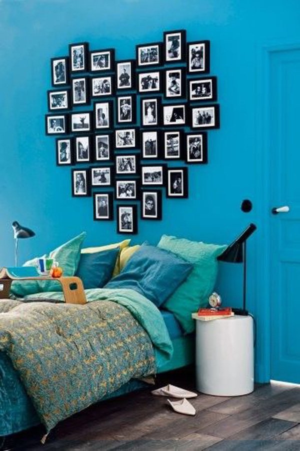 turquoise-bedroom-with-heart-shaped-headboard-made-out-of-picture-frames