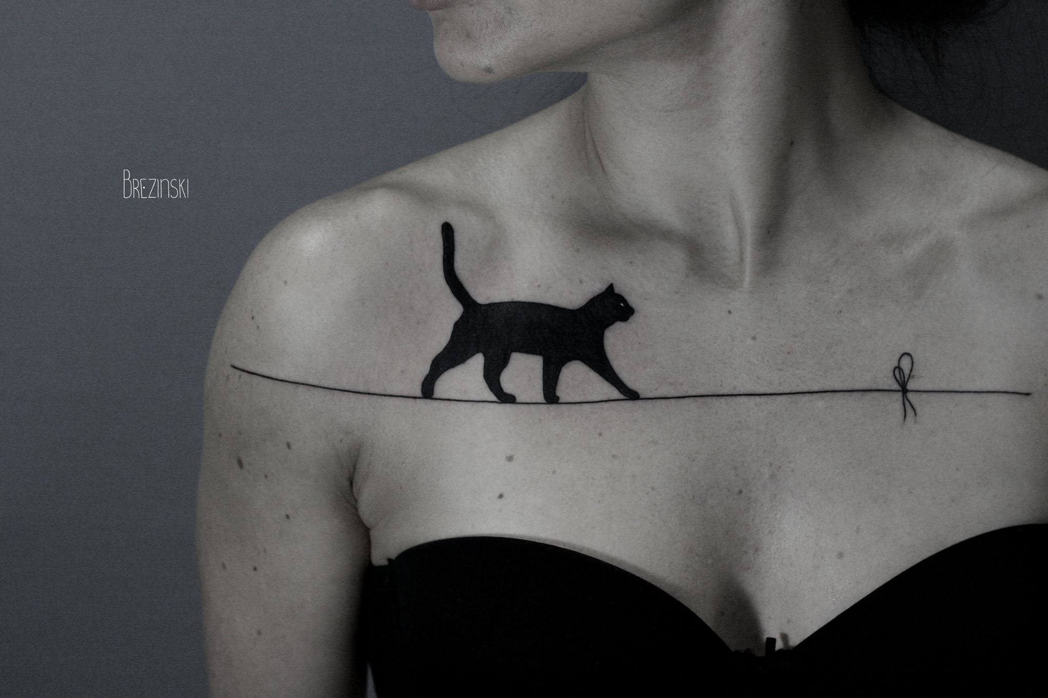 Черная кошка - мистическая татуировка с глубоким смыслом