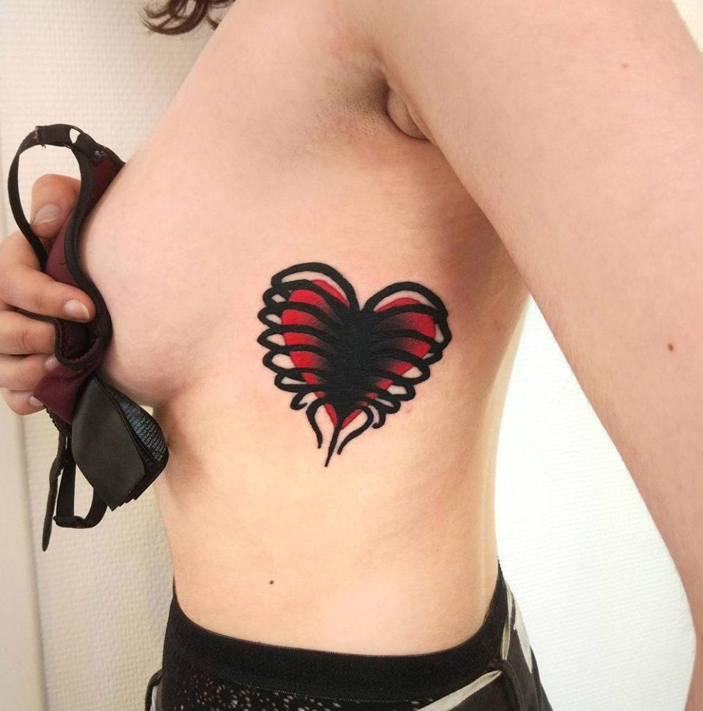 Tiny Heart Tattoo On Side Of Breast