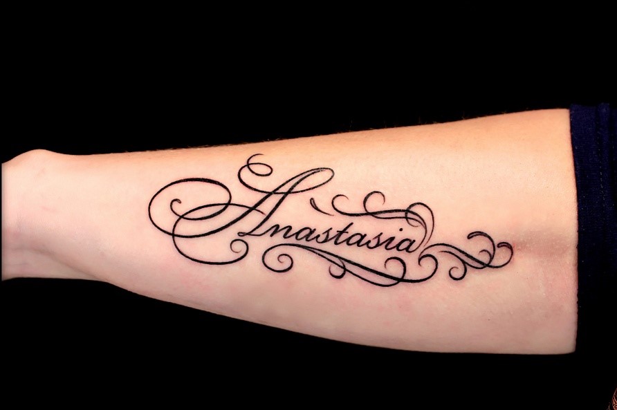 Татуировки на руке женские надписи